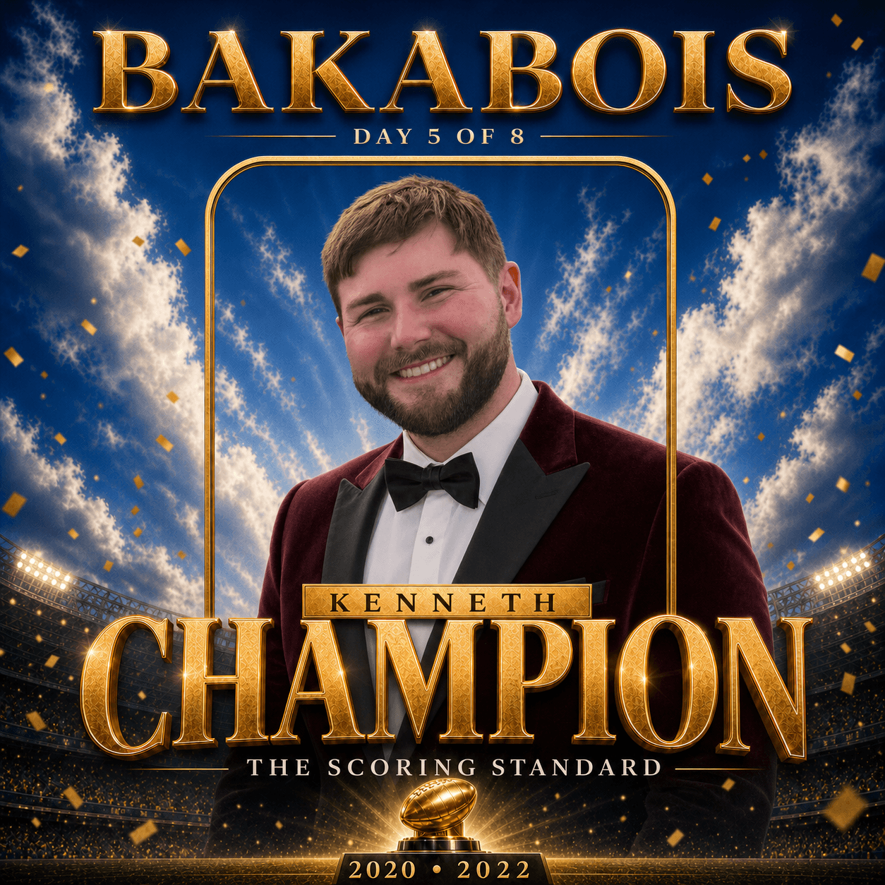 Kenneth smiles in a deep burgundy tuxedo against a royal-blue football-stadium backdrop, framed in gold above a trophy with BakaBois Champions Legacy text reading Day 5 of 8, Champion, The Scoring Standard, and 2020 • 2022.